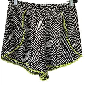 Like Chili Shorts Size Large. Black, White and Yellow trim